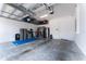 Spacious garage with storage racks and plenty of room for bikes at 15716 Sweet Lemon Way, Winter Garden, FL 34787