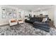 Bright and airy living room with a view into the kitchen space at 15716 Sweet Lemon Way, Winter Garden, FL 34787