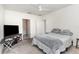 Bedroom features a ceiling fan and a large window at 1864 Green Dragon Dr, St Cloud, FL 34771