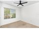 Clean bedroom featuring carpet flooring and a window at 1864 Green Dragon Dr, St Cloud, FL 34771