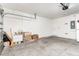 Spacious garage with concrete floor, ideal for storage and projects at 1864 Green Dragon Dr, St Cloud, FL 34771
