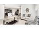 Spacious living area with tile floors seamlessly connecting to the kitchen at 1864 Green Dragon Dr, St Cloud, FL 34771