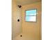 Tiled shower with white subway tiles, a window and black fixtures at 2118 Donegan Pl, Orlando, FL 32826