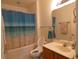 Full bathroom with shower-tub combo, vanity, and modern fixtures at 2406 Grand Central Pkwy # 14, Orlando, FL 32839