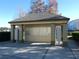 Community mailboxes sheltered under a beige structure with gray pillars at 2406 Grand Central Pkwy # 14, Orlando, FL 32839