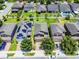 An aerial perspective of houses and homes, featuring lush lawns and solar panels at 251 Domus Ln, Casselberry, FL 32707