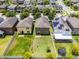 An aerial view showcases the layout of the backyard and its position relative to the neighboring properties at 251 Domus Ln, Casselberry, FL 32707