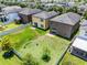 Backyard view of neighboring houses, showing their layouts at 251 Domus Ln, Casselberry, FL 32707
