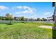 The expansive backyard is enclosed by a white fence at 251 Domus Ln, Casselberry, FL 32707