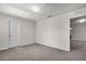 Bedroom featuring carpet floors, neutral walls and view to an adjacent room at 251 Domus Ln, Casselberry, FL 32707