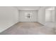 Carpeted bedroom featuring natural light, neutral walls and a bright airy feel at 251 Domus Ln, Casselberry, FL 32707