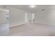 Large bonus room showcasing neutral carpet and access to various rooms at 251 Domus Ln, Casselberry, FL 32707