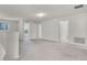 Spacious bonus room with neutral carpet, white walls, and multiple doorways at 251 Domus Ln, Casselberry, FL 32707