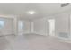 Expansive bonus room with neutral carpet, white walls, and plenty of natural light at 251 Domus Ln, Casselberry, FL 32707