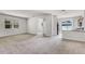 Bright living room with neutral walls, carpet and a window providing natural light at 251 Domus Ln, Casselberry, FL 32707