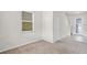 Living room featuring neutral carpet, natural light and front entry view at 251 Domus Ln, Casselberry, FL 32707