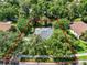 Aerial view of the property outlined in red showing the home and lot at 2563 Breezy Meadow Rd, Apopka, FL 32712