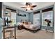 Bedroom with desk, telescope, and window providing natural light at 2563 Breezy Meadow Rd, Apopka, FL 32712