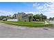 Corner-lot home with mature landscaping, a brick-paved driveway, a fenced yard, and a convenient two-car garage at 2850 Spring Heather Pl, Oviedo, FL 32766