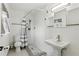 Bathroom featuring updated fixtures, clean white tile, and a spacious walk-in shower at 2908 Clear Way, Orlando, FL 32805