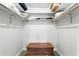 Organized closet with shelving for shoes, linens, and storage chest at 2908 Clear Way, Orlando, FL 32805