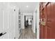 Bright home entryway with wood-look floors and fresh white walls creating a welcoming atmosphere at 2908 Clear Way, Orlando, FL 32805