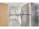 Corner of kitchen showing stainless steel appliances and white cabinets at 323 Scotland Dr, Daytona Beach, FL 32117
