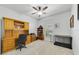 Bedroom area featuring carpet flooring, natural light, and functional desk unit at 352 Giovani Blvd, Clermont, FL 34715