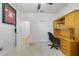 Bedroom featuring carpet flooring, natural light, and functional desk unit at 352 Giovani Blvd, Clermont, FL 34715