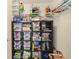 Playroom storage area featuring shelving packed with Lego sets and other toys at 352 Giovani Blvd, Clermont, FL 34715