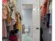 A walk-in closet featuring access to the toilet room at 3946 Versailles Dr # 3946B, Orlando, FL 32808