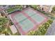 Aerial view of community tennis courts, a great amenity for active residents at 3946 Versailles Dr # 3946B, Orlando, FL 32808