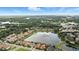 Beautiful community featuring waterfront homes, mature trees, and well-maintained landscapes at 3995 Equine Cv, Lake Mary, FL 32746