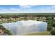 Beautiful aerial view of lakeside homes in a well maintained community at 3995 Equine Cv, Lake Mary, FL 32746
