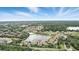Aerial view of the neighborhood with a lake nearby at 3995 Equine Cv, Lake Mary, FL 32746