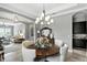 Dining room with view to a comfortable living space, ideal for Gathering gatherings and entertaining at 3995 Equine Cv, Lake Mary, FL 32746
