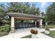 Convenient community mailboxes in a covered, well-maintained area surrounded by landscaping at 3995 Equine Cv, Lake Mary, FL 32746