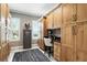Office featuring custom wood cabinets, built-in desk, and a neutral-toned rug, creating an organized workspace at 3995 Equine Cv, Lake Mary, FL 32746