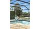 Relaxing pool with tranquil lake views offers a place to cool off and unwind in your private outdoor space at 3995 Equine Cv, Lake Mary, FL 32746