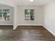 Bright living room featuring wood-look floors and natural light at 412 Ranch Trl, Casselberry, FL 32707