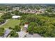 Aerial view of property in the community with trees and grass at 516 Tybee Pl, Orlando, FL 32829