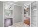 Interior view highlighting hardwood floors and an open doorway leading to a cozy living space at 516 Tybee Pl, Orlando, FL 32829