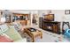 Inviting living room with a fireplace, kitchen access, and stylish furnishings for comfortable living at 5201 S Atlantic Ave # 703A, New Smyrna Beach, FL 32169