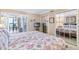 Serene main bedroom with soft lighting, coastal decor, and ocean views for a tranquil retreat at 5201 S Atlantic Ave # 703A, New Smyrna Beach, FL 32169