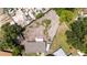 Aerial view of the property showing the house, yard, and surrounding neighborhood at 5300 Locksley Ave, Orlando, FL 32810