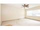 Empty bedroom with carpet, a ceiling fan, and natural light at 5300 Locksley Ave, Orlando, FL 32810