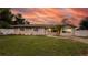 Charming single-story home featuring a well-maintained lawn, tidy landscaping, and a light beige exterior paint at 5300 Locksley Ave, Orlando, FL 32810