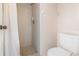 Simple bathroom with a tiled shower and a standard toilet at 5308 Pinebury Ct, Orlando, FL 32808