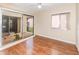 Bedroom with sliding glass doors, wood floors, and a ceiling fan at 5308 Pinebury Ct, Orlando, FL 32808