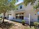 Spacious backyard with a white fence, patio area, and lush landscaping at 576 Prospect Pt, Oviedo, FL 32765